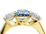 Yellow gold Fancy Blue Emerald Cut Three-Stone Diamond Ring with Prong Setting on a Classic Band_16