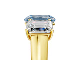 Yellow gold Fancy Blue Emerald Cut Three-Stone Diamond Ring with Prong Setting on a Classic Band_17