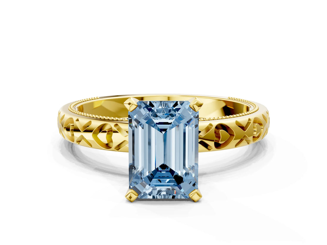Yellow gold Fancy Blue Emerald  Solitaire Diamond Engagement Ring with XO Engraved Band and Four-Prong Setting 1