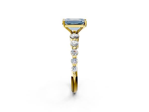 Yellow gold Fancy Blue Emerald Cut Solitaire Diamond Ring with Pave Band and Four-Prong Setting