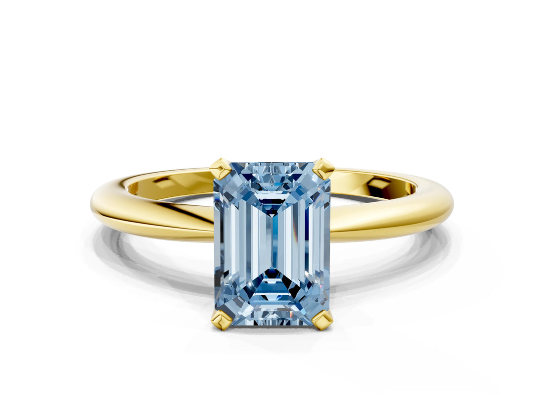 Yellow gold Fancy Blue Emerald  Solitaire Diamond Ring with Six-Prong Setting on a Classic Band