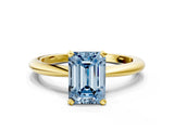 Yellow gold Fancy Blue Emerald  Solitaire Diamond Ring with Six-Prong Setting on a Classic Band