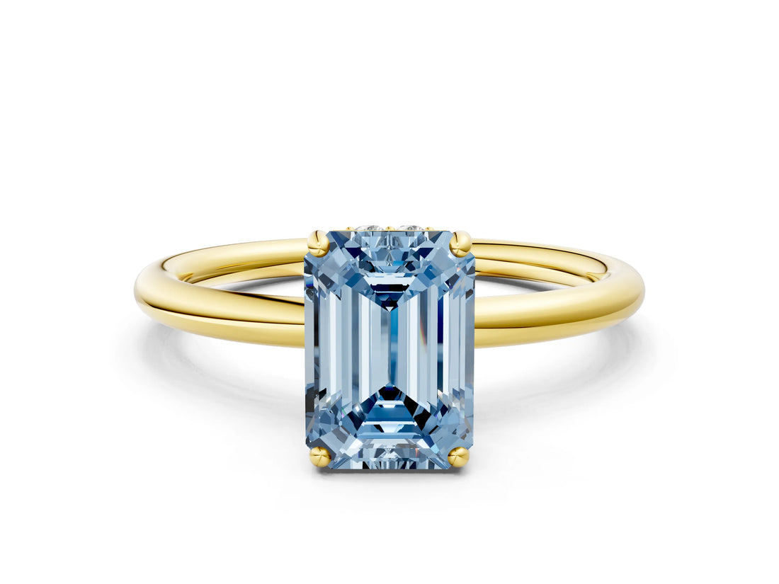 Yellow gold Fancy Blue Emerald  Solitaire Diamond Ring with a Classic Band and Four-Prong Setting