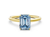 Yellow gold Fancy Blue Emerald  Solitaire Diamond Ring with a Classic Band and Four-Prong Setting