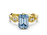 Yellow gold Fancy Blue Emerald  Solitaire Twist Band with Leaf Prong Setting 1