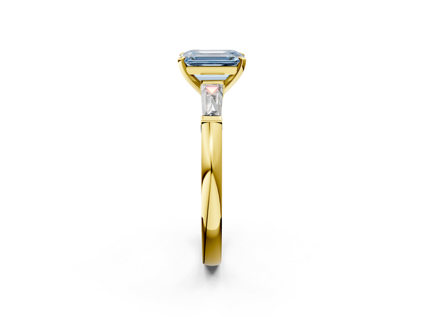 Yellow gold Fancy Blue Emerald  Solitaire with Tapered Baguette Side Stones on a Classic Band with Four-Prong Setting