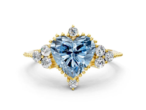 Yellow gold Fancy Blue Heart Cut Brilliant Diamond with Cluster Setting on a Beaded Band and Four-Prong Setting