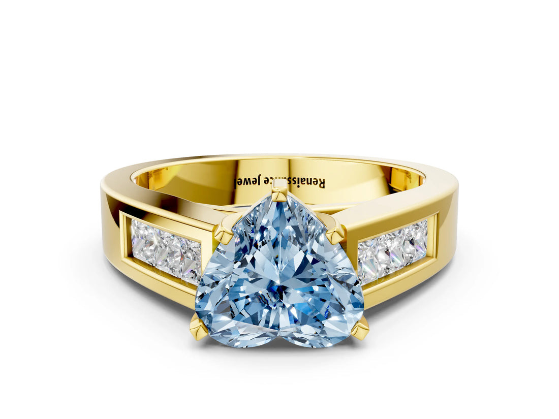 Yellow gold Fancy Blue Heart Cut Cut Channel Set Solitaire Ring with Four-Prong Setting