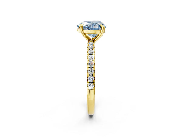 Yellow gold Fancy Blue Heart Cut Diamond Brilliant Solitaire Ring with Pavé Band and Four-Prong Setting