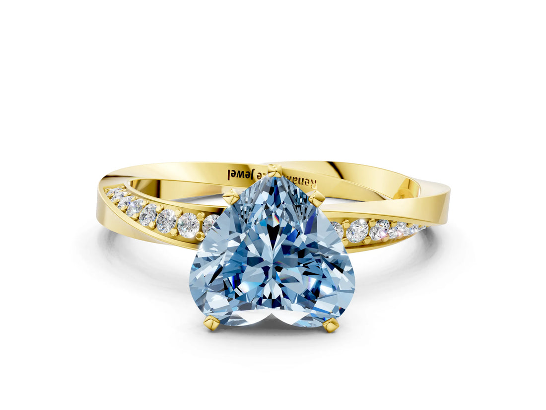 Yellow gold Fancy Blue Heart Cut Diamond Engagement Ring with Side Stone Accents and Four-Prong Setting