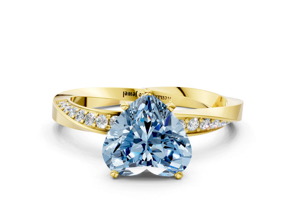 Yellow gold Fancy Blue Heart Cut Diamond Engagement Ring with Side Stone Accents and Four-Prong Setting
