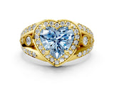 Yellow gold Fancy Blue Heart Cut Diamond Halo Ring with Split Shank and Bezel Accents and Four-Prong Setting