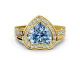 Yellow gold Fancy Blue Heart Cut Diamond Halo Ring with Split Shank and Bezel Accents and Prong Setting