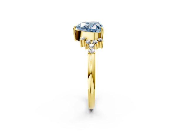 Yellow gold Fancy Blue Heart Cut Diamond Ring with Side Stones and Four-Prong Setting