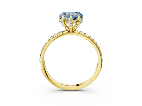 Yellow gold Fancy Blue Heart Cut Diamond Solitaire Ring with Four-Prong Setting and Pavé Band