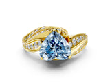 Yellow gold Fancy Blue Heart Cut Diamond Solitaire Ring with Prong Setting and Twisted Pavé Band
