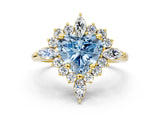 Yellow gold Fancy Blue Heart Cut Halo Diamond Cluster Ring with Marquise and Round Stones on a White Gold Band with Prong Setting