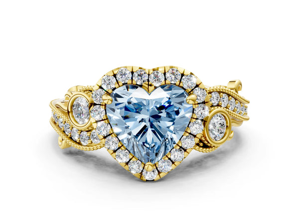 Yellow gold Fancy Blue Heart Cut Halo Diamond Ring with Milgrain and Bezel Accents on a Split Shank Band
