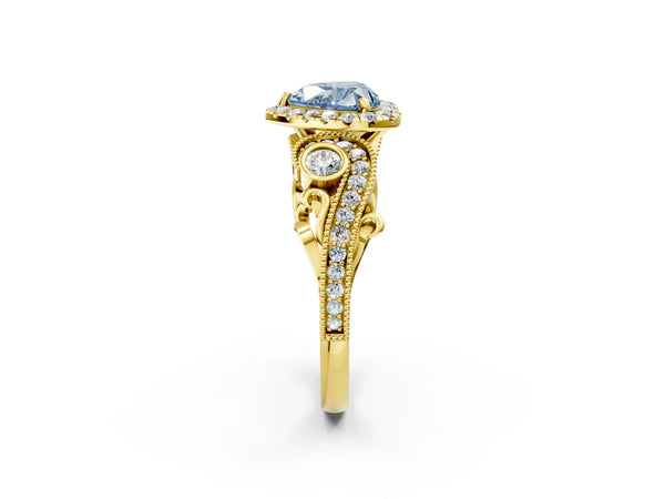 Yellow gold Fancy Blue Heart Cut Halo Diamond Ring with Milgrain and Bezel Accents on a Split Shank Band