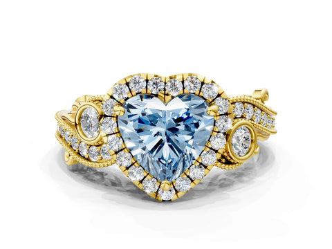 Yellow gold Fancy Blue Heart Cut Halo Diamond Ring with Milgrain and Bezel Accents on a Split Shank Band