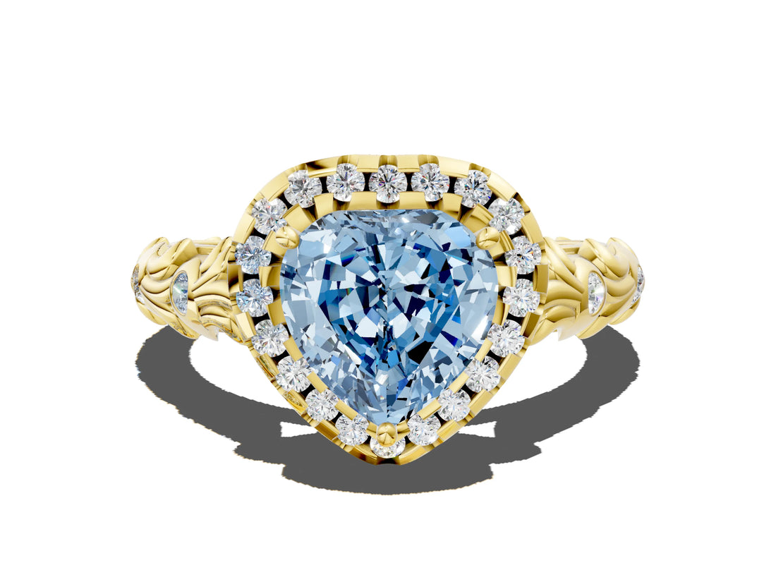 Yellow gold Fancy Blue Heart Cut Halo Diamond Solitaire with Filigree Band and Four-Prong Setting