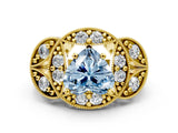 Yellow gold Fancy Blue Heart Cut Halo Milgrain Diamond Engagement Ring with Leaf Band and Four-Prong Setting