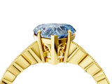 Yellow gold Fancy Blue Heart Cut Solitaire Diamond Ring with Infinity Twist Band and Four-Prong Setting_4