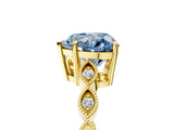 Yellow gold Fancy Blue Heart Cut Solitaire Diamond Ring with Infinity Twist Band and Four-Prong Setting_5
