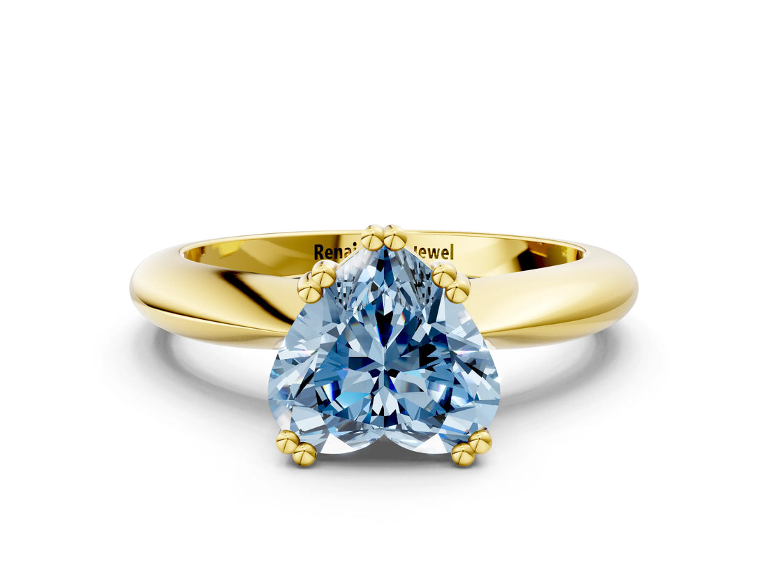 Yellow gold Fancy Blue Heart  Cut Solitaire Engagement Ring with Tapered Band and Four-Prong Setting