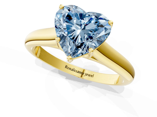 Yellow gold Fancy Blue Heart Cut Solitaire Engagement Ring with Tapered Band and Four-Prong Setting