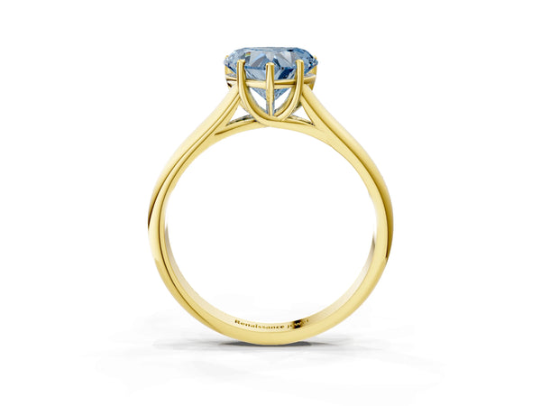 Yellow gold Fancy Blue Heart Cut Solitaire Engagement Ring with Tapered Band and Four-Prong Setting
