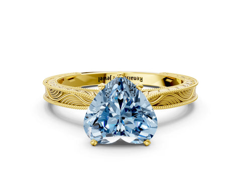 Yellow gold Fancy Blue Heart Cut Solitaire Milgrain Engraved Band with Four-Prong Setting