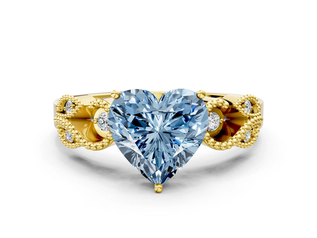 Yellow gold Fancy Blue Heart Cut Solitaire Milgrain Leaf Band with Prong Setting