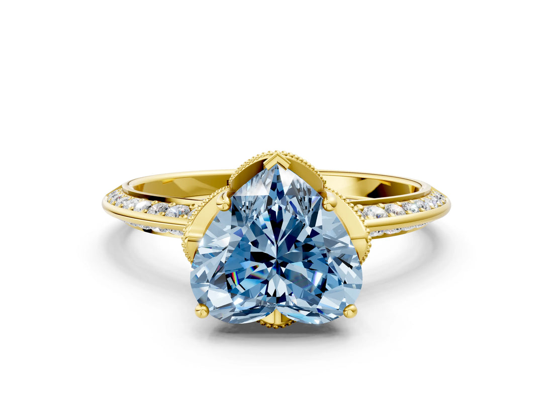 Yellow gold Fancy Blue Heart Cut Solitaire Split Shank Pave Diamond Engagement Ring with Four-Prong Setting