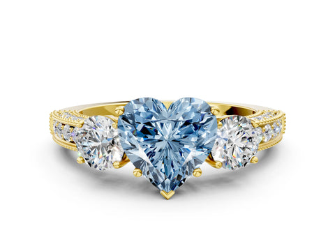 Yellow gold Fancy Blue Heart Cut Three-Stone Diamond Ring with Pavé Band and Four-Prong Setting