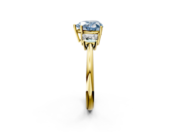 Yellow gold Fancy Blue Heart  Diamond Three-Stone Ring with Trapezoid Side Stones and Prong Setting