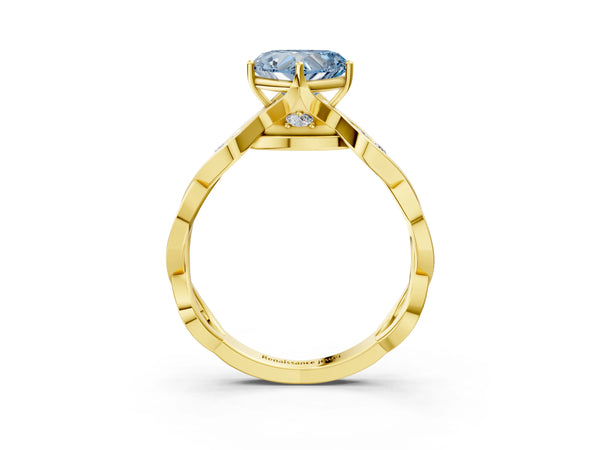 Yellow gold Fancy Blue Heart  Solitaire Twist Band with Leaf Prong Setting
