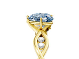 Yellow gold Fancy Blue Heart  Solitaire Twist Band with Leaf Prong Setting 5
