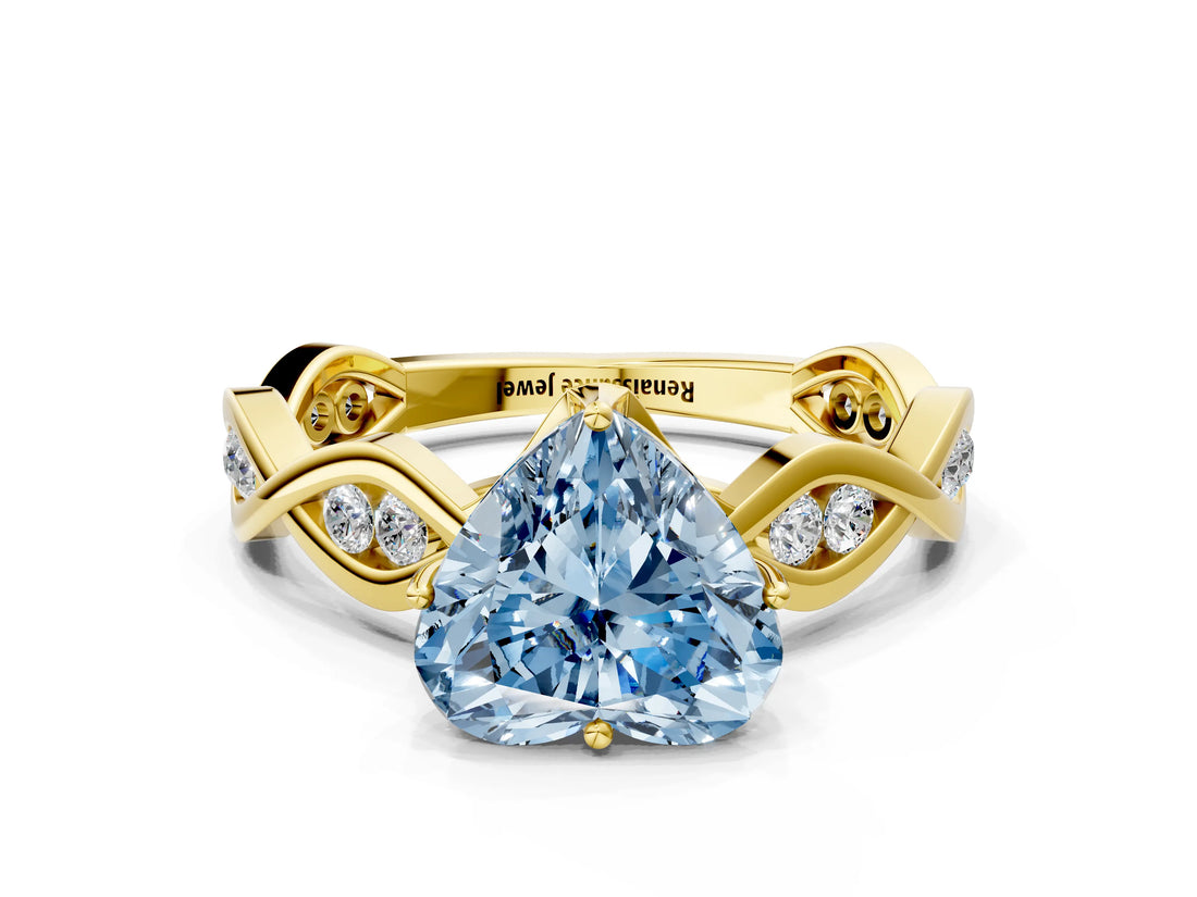 Yellow gold Fancy Blue Heart  Solitaire Twist Band with Leaf Prong Setting