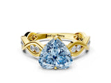 Yellow gold Fancy Blue Heart  Solitaire Twist Band with Leaf Prong Setting