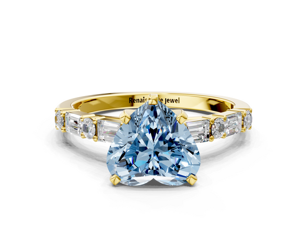 Yellow gold Fancy Blue Heart Cut Diamond Solitaire with Side Baguettes and Channel Set Band