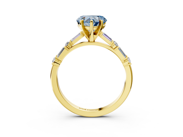 Yellow gold Fancy Blue Heart Cut Diamond Solitaire with Side Baguettes and Channel Set Band