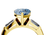 Yellow gold Fancy Blue Heart  Solitaire with Tapered Baguette Side Stones on a Classic Band with Four-Prong Setting_80