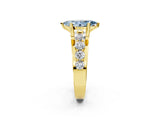Yellow gold Fancy Blue Marquise  Brilliant Solitaire with Side Stones on a Pave Band and Four-Prong Setting_56