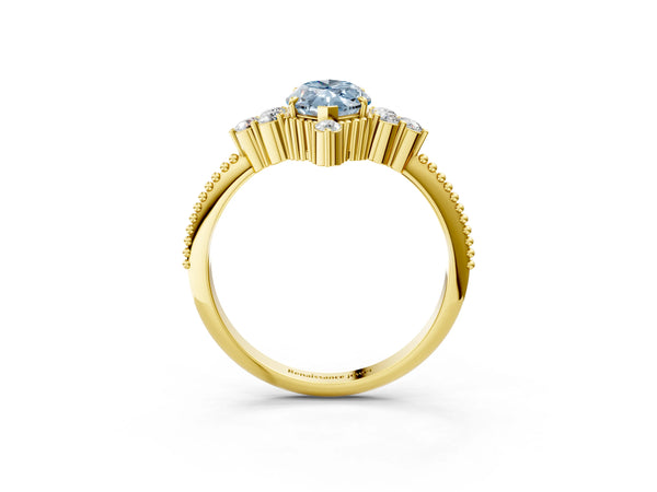 Yellow gold Fancy Blue Marquise Cut Brilliant Diamond with Cluster Setting on a Beaded Band and Four-Prong Setting