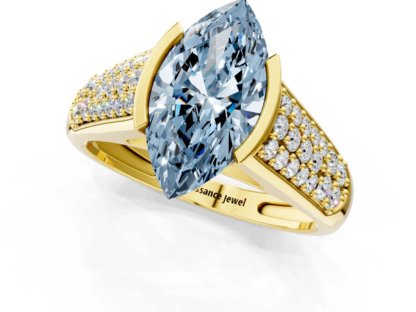 Yellow gold Fancy Blue Marquise Cut Diamond Channel Set Pave Band with Tension Prong Setting