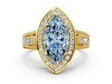 Yellow gold Fancy Blue Marquise Cut Diamond Halo Ring with Split Shank and Bezel Accents and Prong Setting