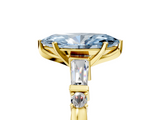 Yellow gold Fancy Blue Marquise  Cut Diamond Ring with Baguette Side Stones, Channel Set Band, and Four-Prong Setting_25