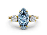 Yellow gold Fancy Blue Marquise Cut Diamond Three-Stone Engagement Ring with Prong Setting and Pavé Band