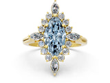Yellow gold Fancy Blue Marquise Cut Halo Diamond Cluster Ring with Marquise and Round Stones on a White Gold Band with Prong Setting